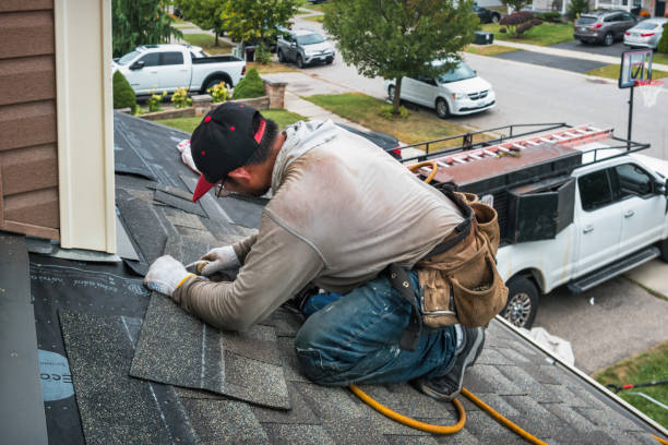 Professional Emergency Roof Repair technician working in Versailles, IN